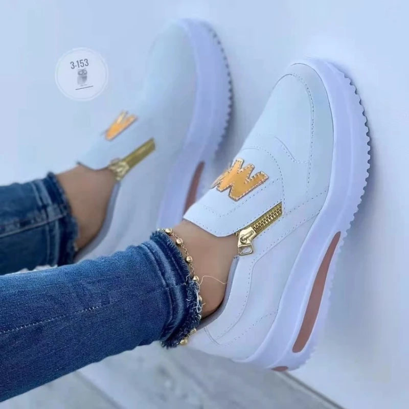 Zarelli™ Slip-On Sneakers with Quilted Panels, Metallic Side Zipper, and Gold-Tone Detail