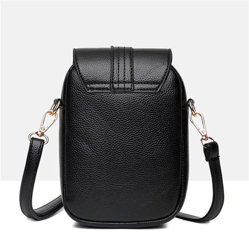 Women's Compact Leather Crossbody Bag with Minimalist Design and Adjustable Strap!