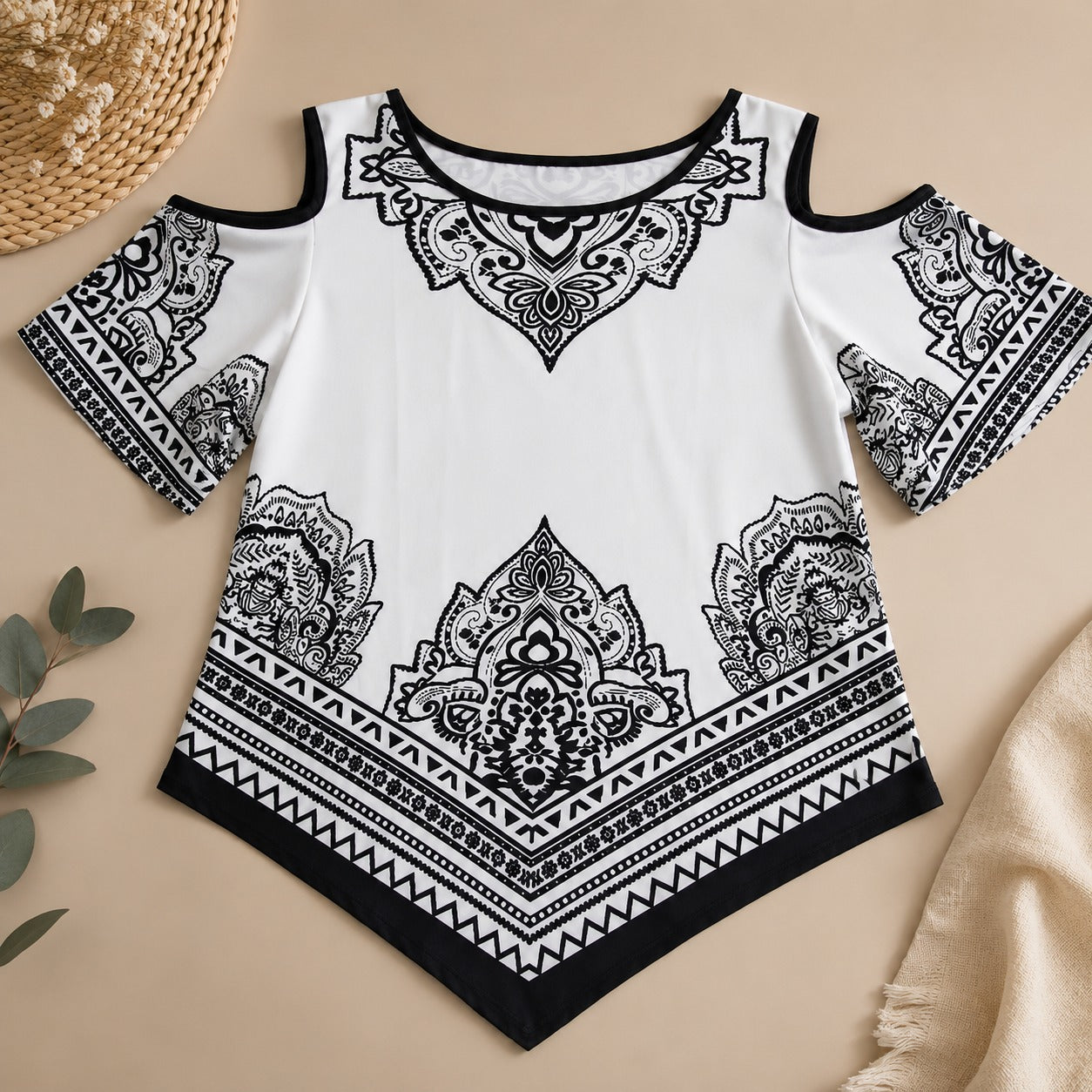 Calisse™ Blouse with Cold-Shoulder Design, Ornamental Print and Asymmetrical Hem.