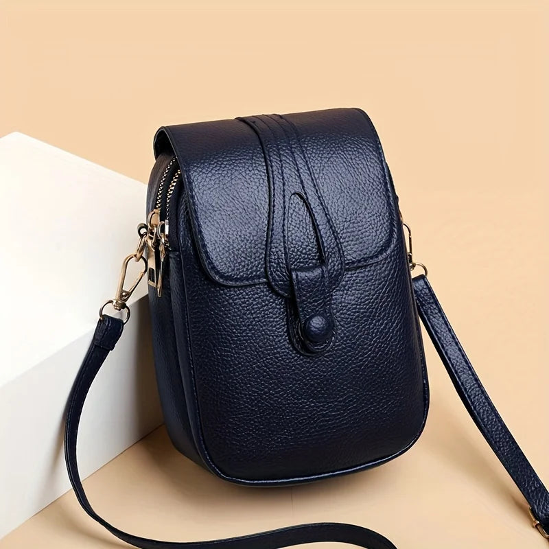 Women's Compact Leather Crossbody Bag with Minimalist Design and Adjustable Strap!
