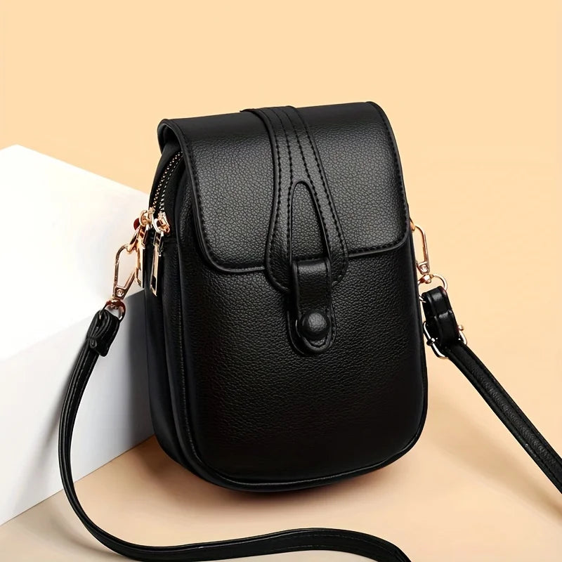 Women's Compact Leather Crossbody Bag with Minimalist Design and Adjustable Strap!