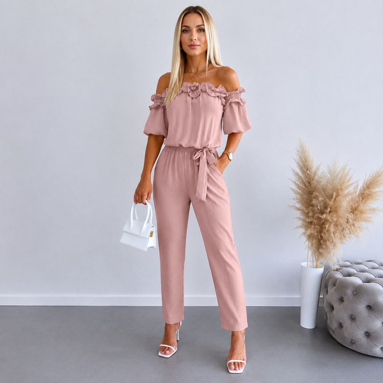 Jumpsuit Norelle™ with Ruffled Off-Shoulder Neckline and Tie Waist.