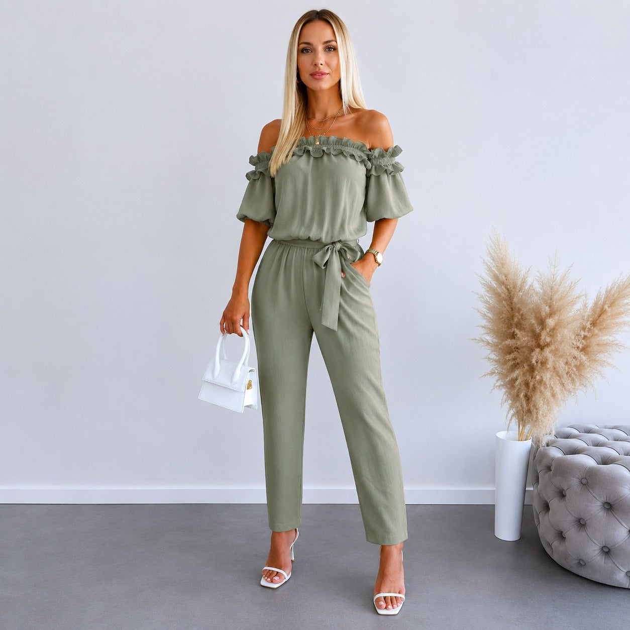 Jumpsuit Norelle™ with Ruffled Off-Shoulder Neckline and Tie Waist.